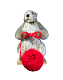 Realistic animatronic marmot with wool ball for Christmas seasonal storefront ideas or holidays themed events