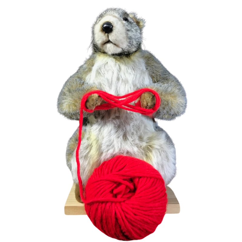 Realistic animatronic marmot with wool ball for Christmas seasonal storefront ideas or holidays themed events