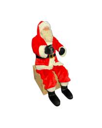 Pere Noel rouge assis