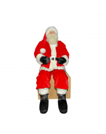 Pere Noel rouge assis